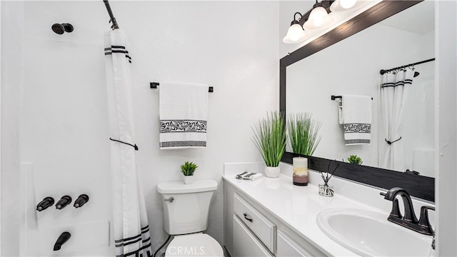 full bathroom with shower / bath combo, vanity, and toilet