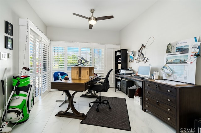 office space featuring ceiling fan and light tile patterned floors