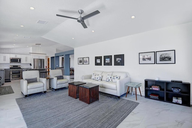 living room with ceiling fan