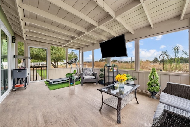 sunroom / solarium with wood ceiling and beamed ceiling