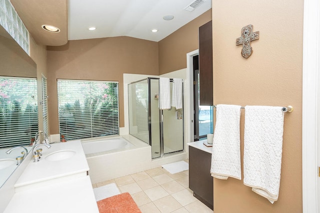 bathroom featuring vanity, plus walk in shower, lofted ceiling, and tile patterned floors