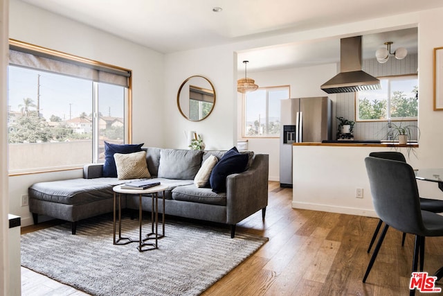 living room featuring hardwood / wood-style flooring and plenty of natural light