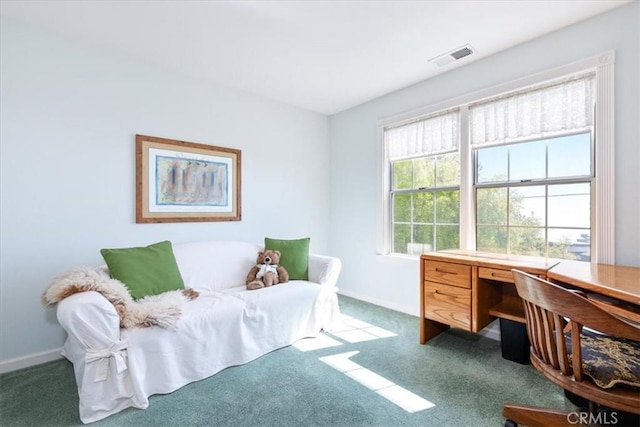 bedroom featuring dark colored carpet