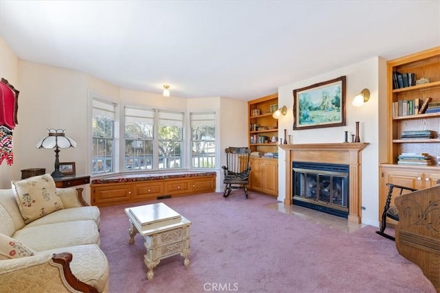 living room featuring built in features and carpet flooring