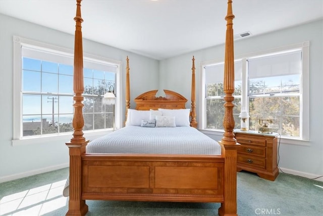 bedroom with light carpet