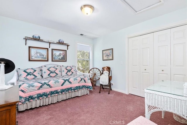 bedroom with a closet and carpet floors