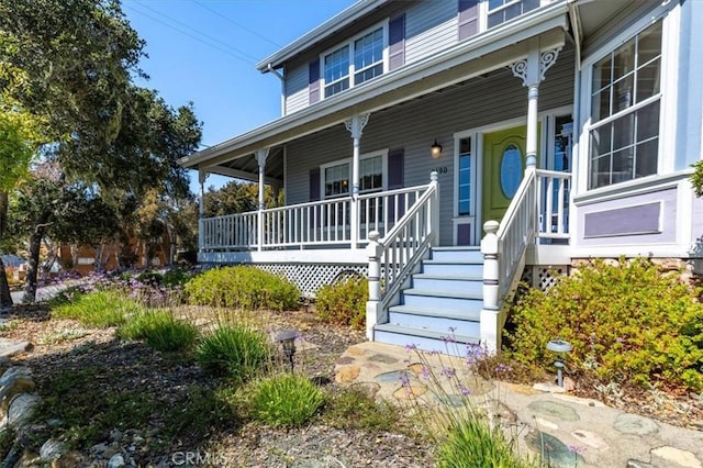 view of front of property featuring covered porch