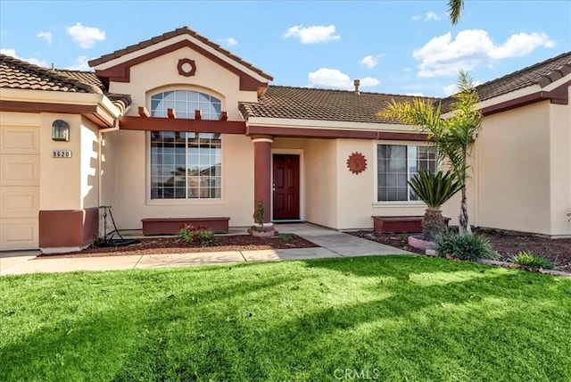 exterior space featuring a front yard