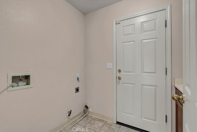 laundry room with washer hookup, light tile patterned floors, gas dryer hookup, and hookup for an electric dryer