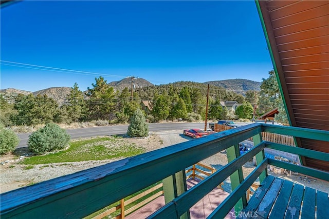 balcony featuring a mountain view