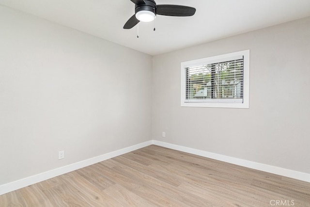 empty room with light hardwood / wood-style floors and ceiling fan