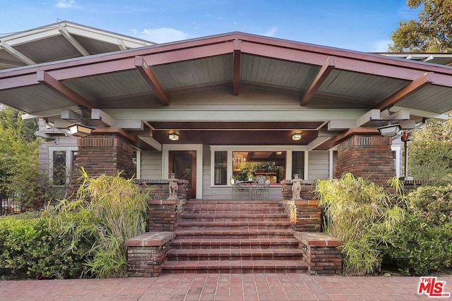 craftsman-style house with covered porch