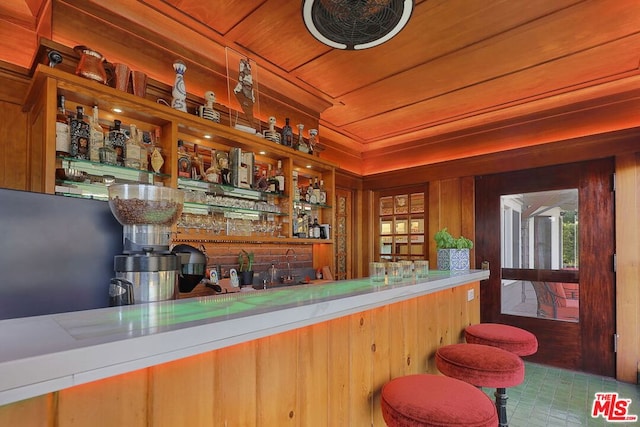 bar with wood ceiling and wood walls