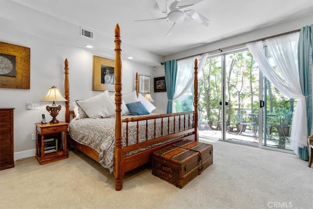 bedroom featuring light carpet, access to exterior, multiple windows, and visible vents