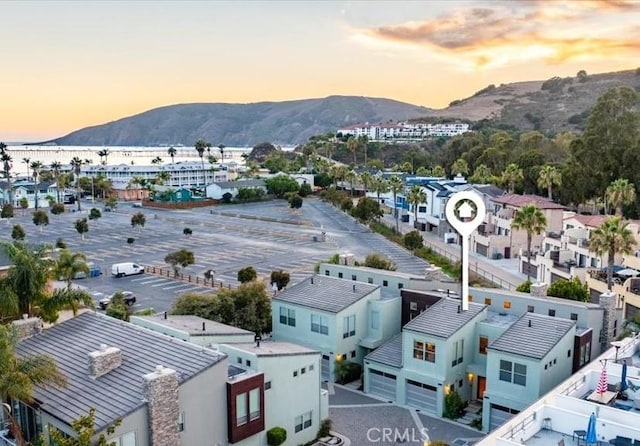 birds eye view of property featuring a residential view and a mountain view