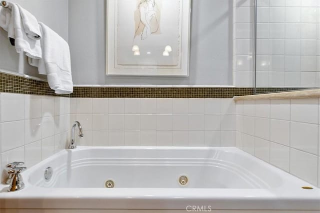 bathroom featuring a tub