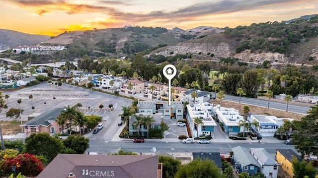 drone / aerial view with a residential view and a mountain view