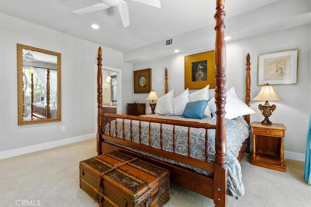 bedroom featuring light colored carpet and ceiling fan