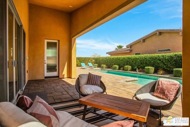 view of patio / terrace featuring a fenced in pool