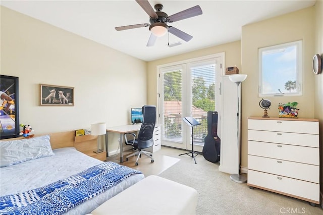 carpeted bedroom with access to outside and ceiling fan