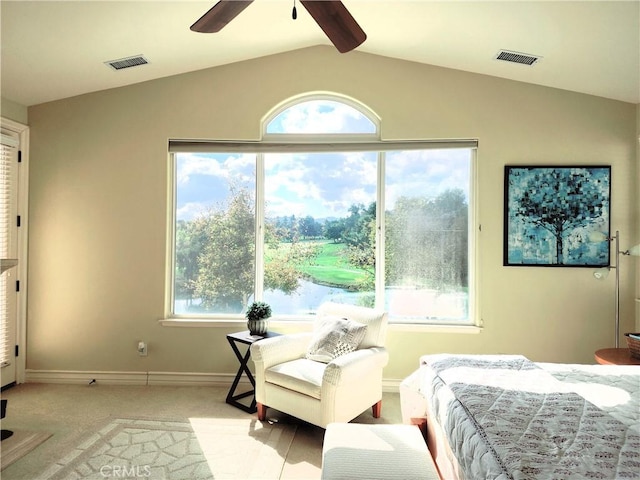 carpeted bedroom featuring ceiling fan and lofted ceiling