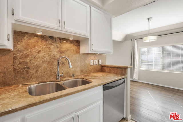 kitchen with white cabinetry, dishwasher, pendant lighting, hardwood / wood-style floors, and sink