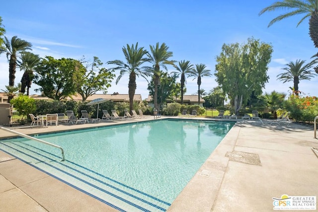 view of pool with a patio area