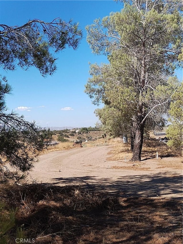 exterior space with a rural view