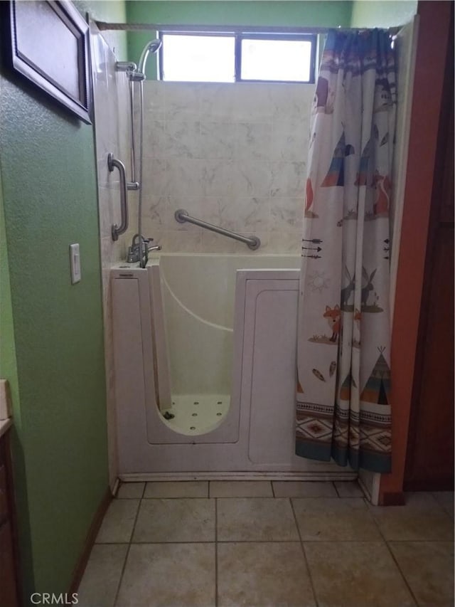 bathroom with tile patterned flooring and a shower with curtain