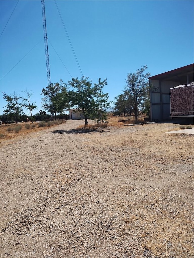 view of yard featuring a rural view