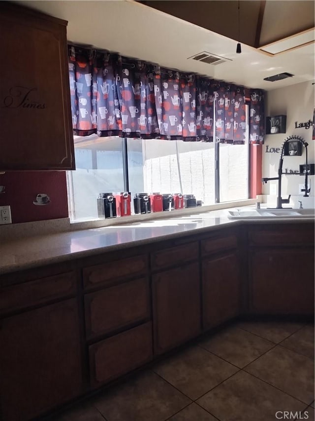 bar with dark tile patterned flooring