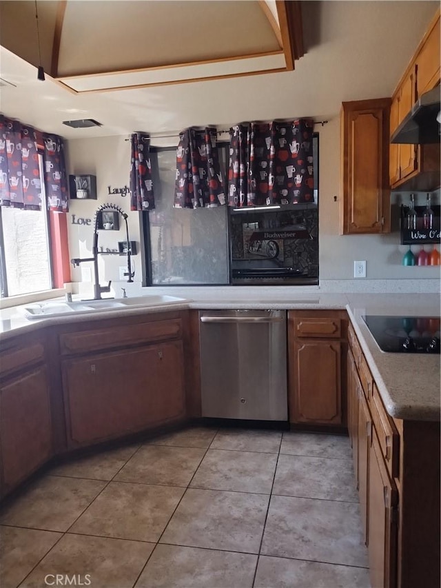 kitchen with stainless steel dishwasher, black electric stovetop, light tile patterned floors, and range hood