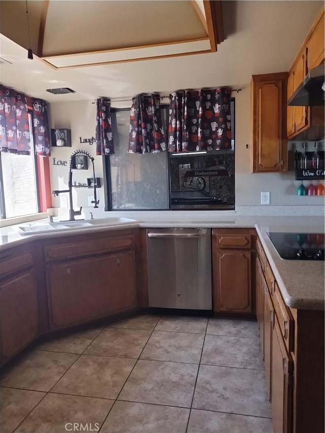 kitchen featuring black electric stovetop, dishwasher, light tile patterned flooring, and range hood