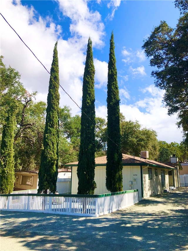 view of front of property featuring central AC unit