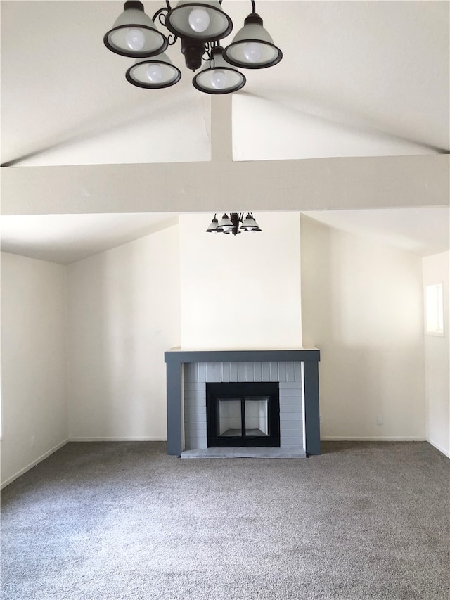 unfurnished living room featuring carpet flooring and a brick fireplace