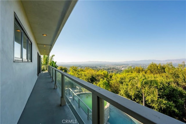 balcony featuring a mountain view