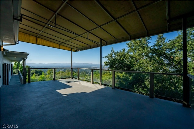 view of patio / terrace with a mountain view