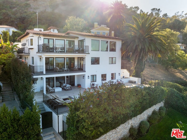 exterior space with a balcony