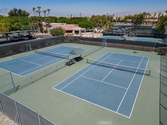 view of sport court with a mountain view