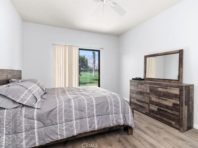 bedroom featuring ceiling fan and hardwood / wood-style flooring