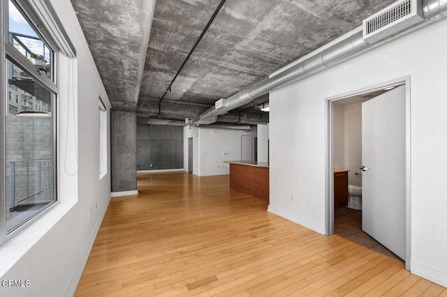 basement with light wood-type flooring