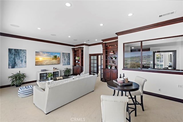 carpeted living room featuring crown molding