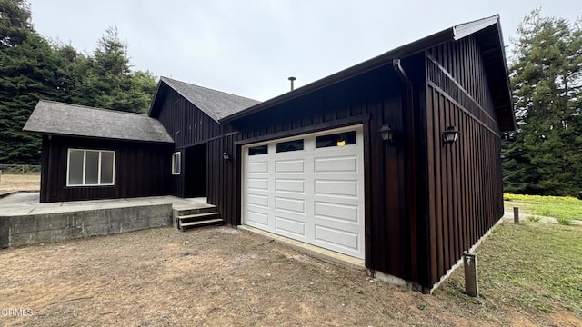 exterior space featuring dirt driveway