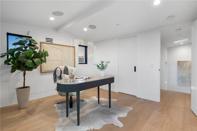 office featuring recessed lighting, vaulted ceiling with beams, and light wood-type flooring