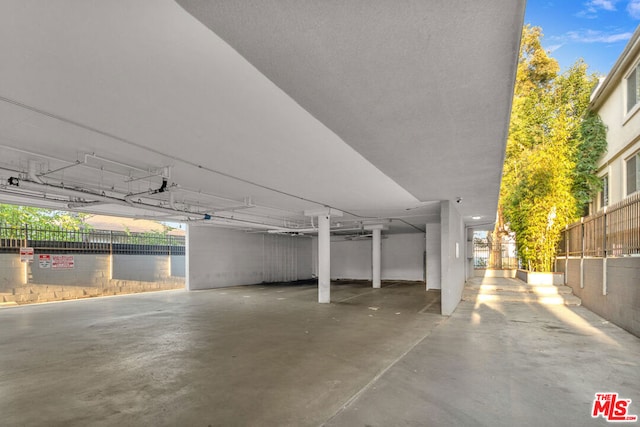 garage featuring a water view