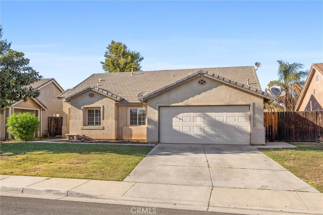 single story home featuring a garage and a front lawn