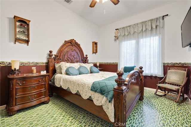 bedroom featuring ceiling fan and lofted ceiling