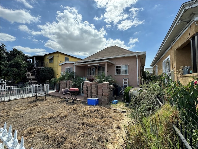 view of front of house with a patio