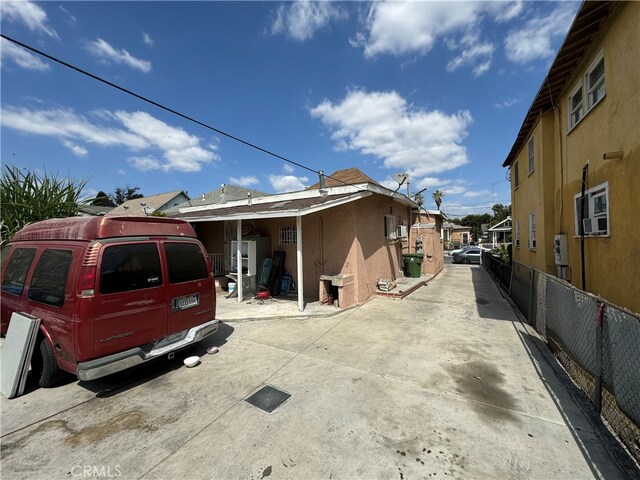 view of side of property featuring cooling unit