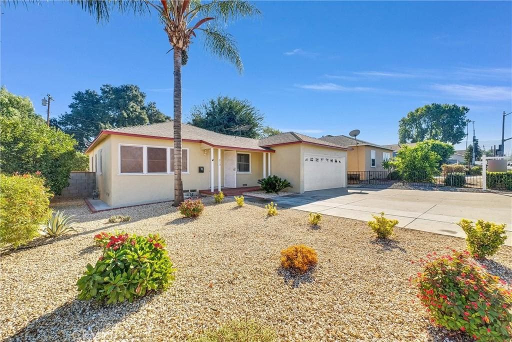 ranch-style home with a garage